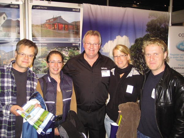 Bayleys Canterbury sales manager Richard Peter, centre, promotes the region�s numerous attributes to a Swiss family who had specifically traveled to the UK to learn more about immigrating to New Zealand.